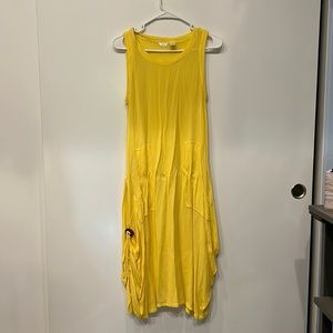 Stunning yellow summer dress. Great with a jean jacket and some slip on Vans.